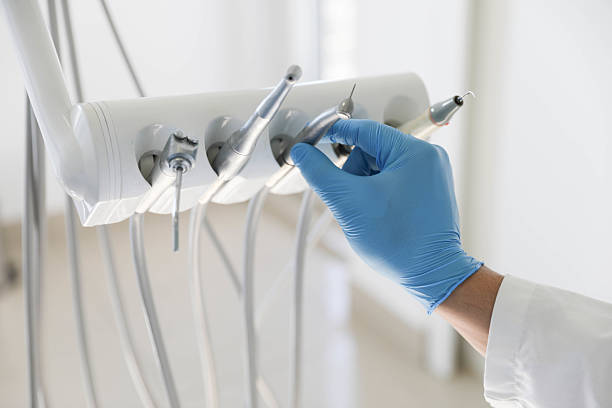 Professional Tooth Extraction technician working in Scotland County County, NC